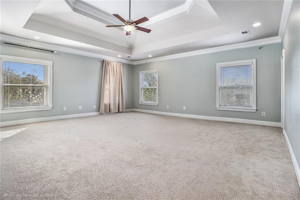 3433 Pierce Street Atlanta, GA 30337 - Photo 26 of 42 an empty room with windows and fan