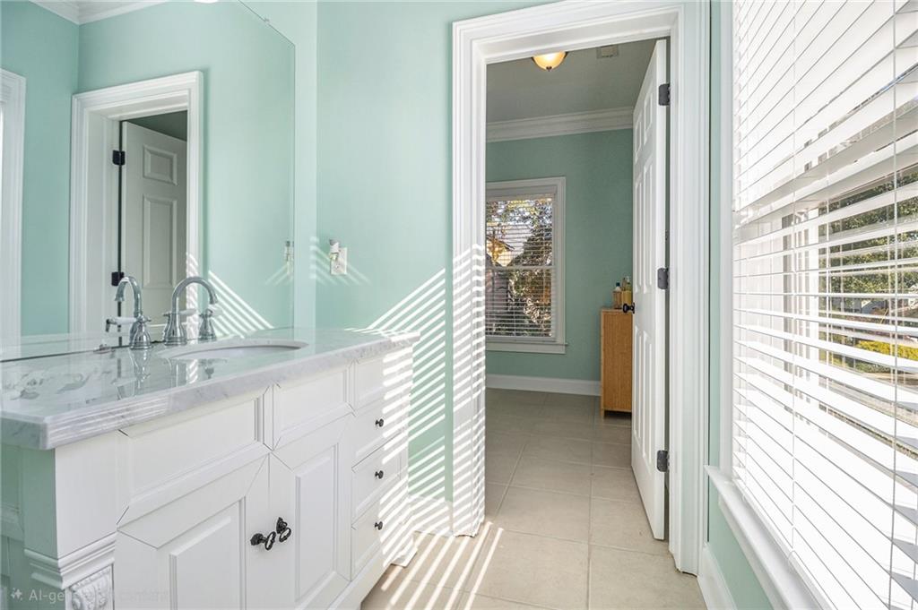 3433 Pierce Street Atlanta, GA 30337 - Photo 29 of 42 a view of a bathroom from a hallway