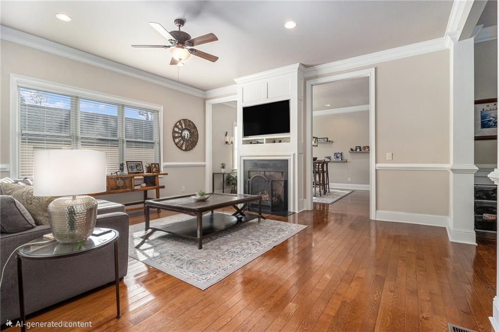 3433 Pierce Street Atlanta, GA 30337 - Photo 4 of 42 a living room with furniture a fireplace and a flat screen tv