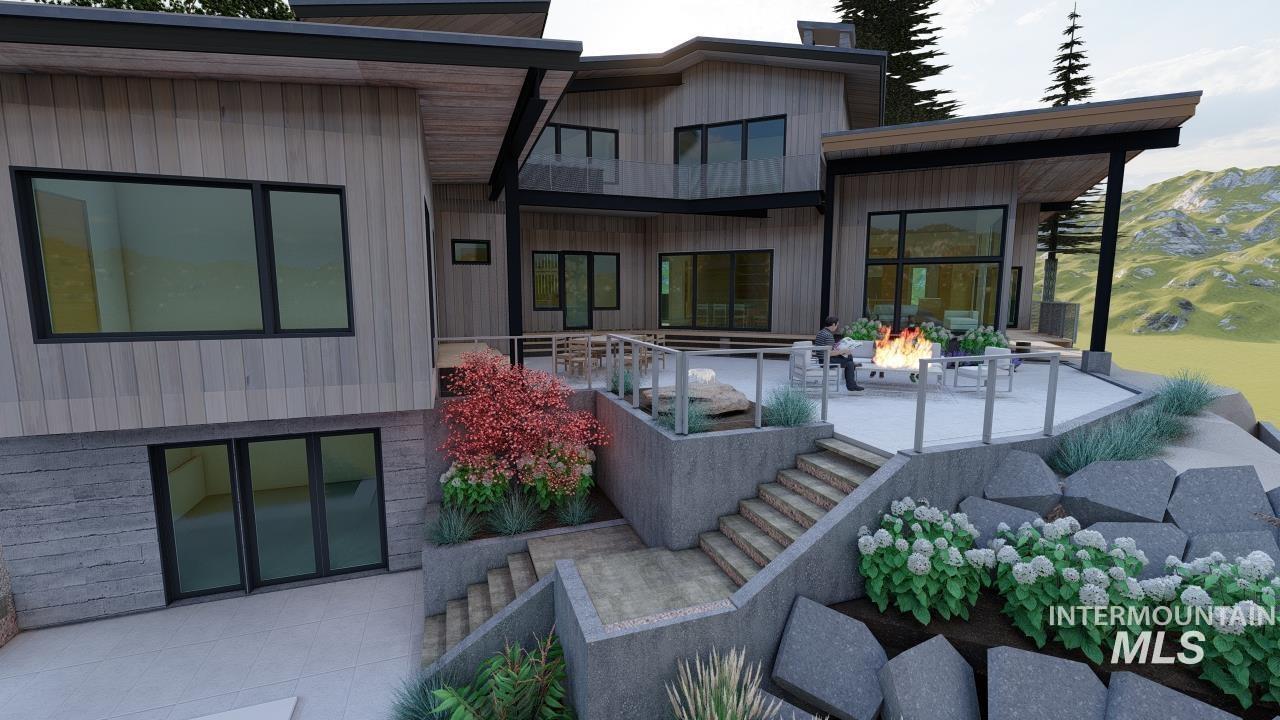 1212 Happy Drive Boise, ID 83706 - Photo 28 of 36 Rear view of house featuring a patio area, a fire pit, and stairs