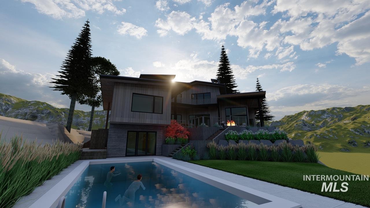 1212 Happy Drive Boise, ID 83706 - Photo 32 of 33 Back of property with stairway, a mountain view, a balcony, and a lawn