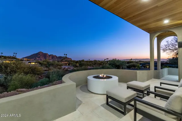 a view of a lake with couches in roof
