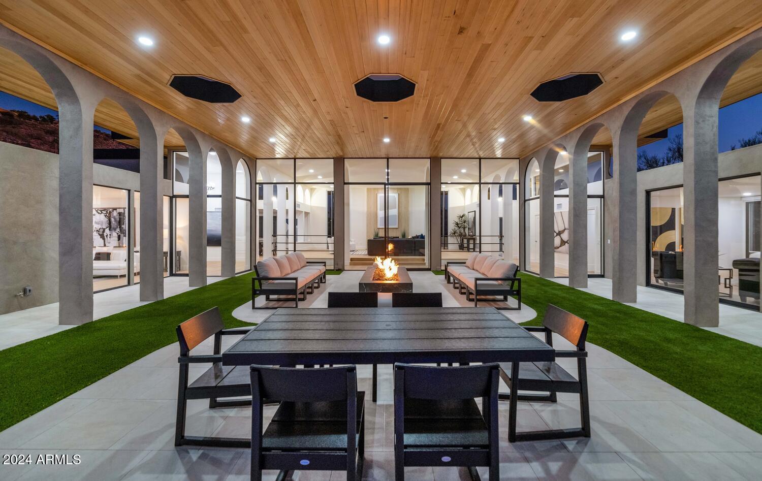 6664 North 40th Street Paradise Valley, AZ 85253 - Photo 26 of 36 a view of a dining room with furniture window and wooden floor