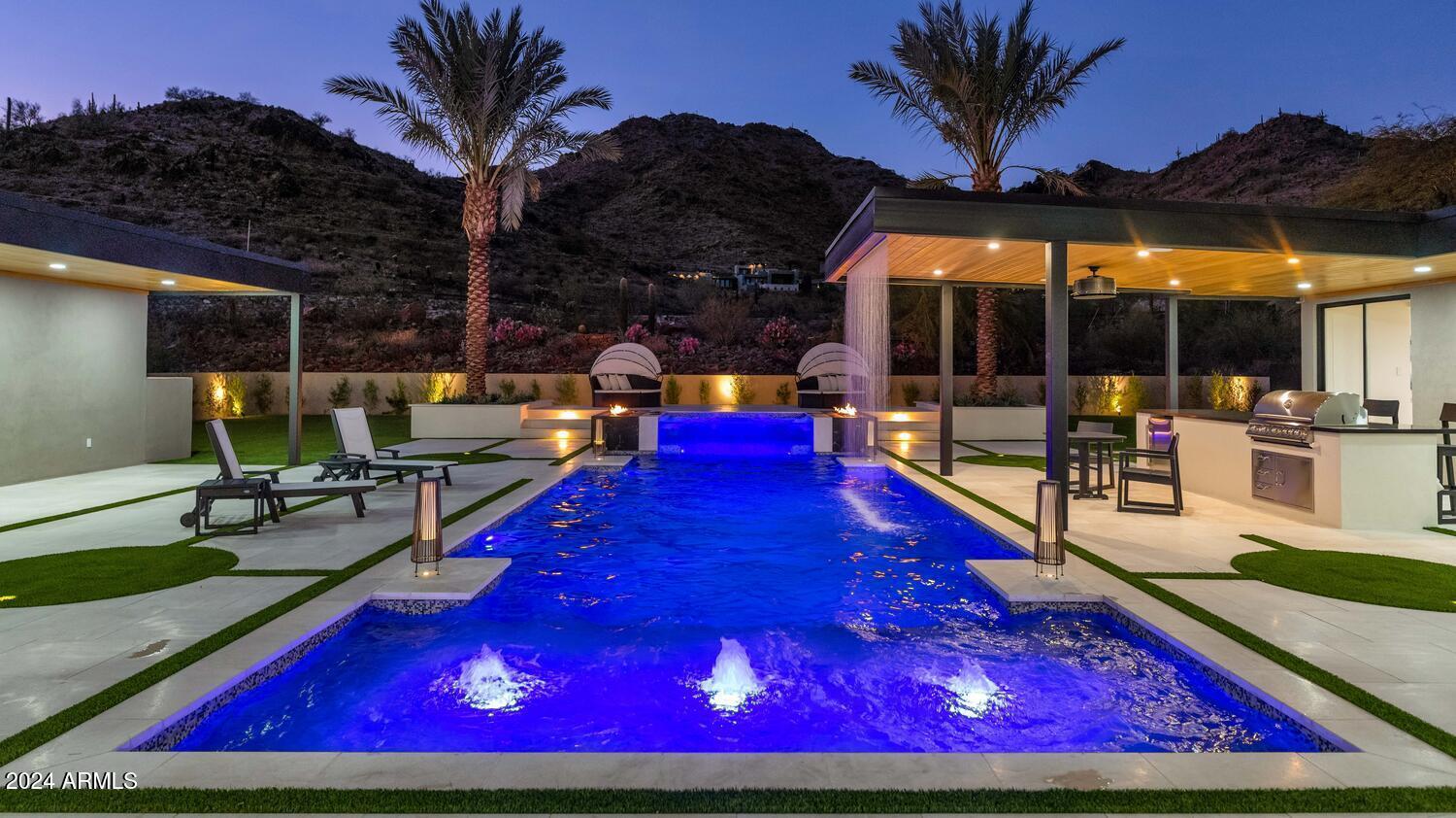 6664 North 40th Street Paradise Valley, AZ 85253 - Photo 32 of 36 a view of swimming pool with seating space