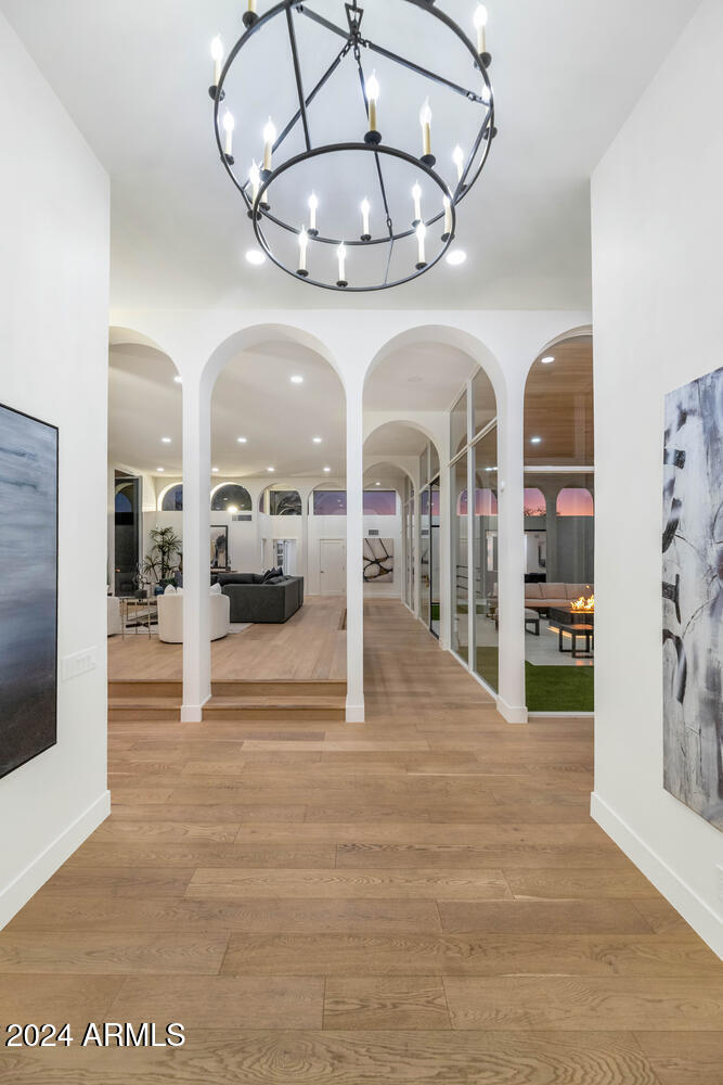 6664 North 40th Street Paradise Valley, AZ 85253 - Photo 4 of 36 a view of hall way with furniture and chandelier