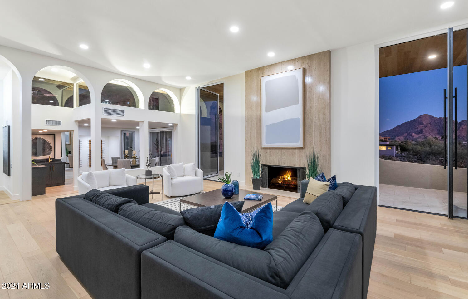 6664 North 40th Street Paradise Valley, AZ 85253 - Photo 6 of 36 a living room with furniture and a fireplace