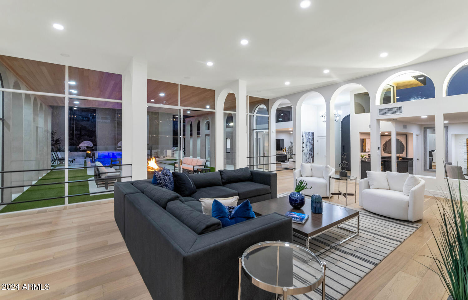 6664 North 40th Street Paradise Valley, AZ 85253 - Photo 8 of 36 a living room with furniture and a fireplace