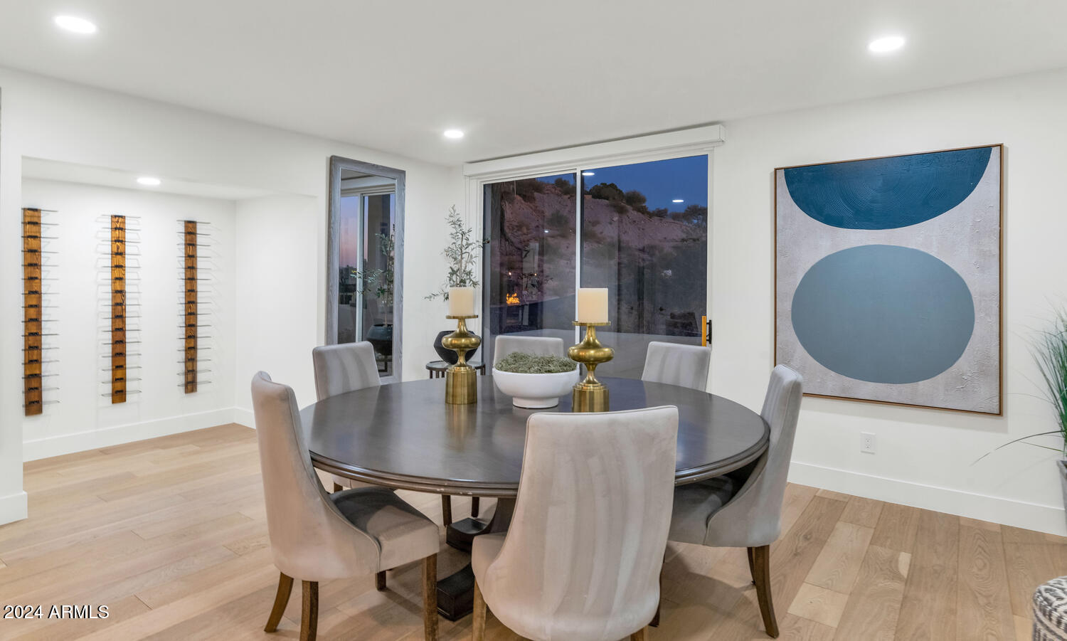 6664 North 40th Street Paradise Valley, AZ 85253 - Photo 10 of 36 a dining room with furniture and wooden floor