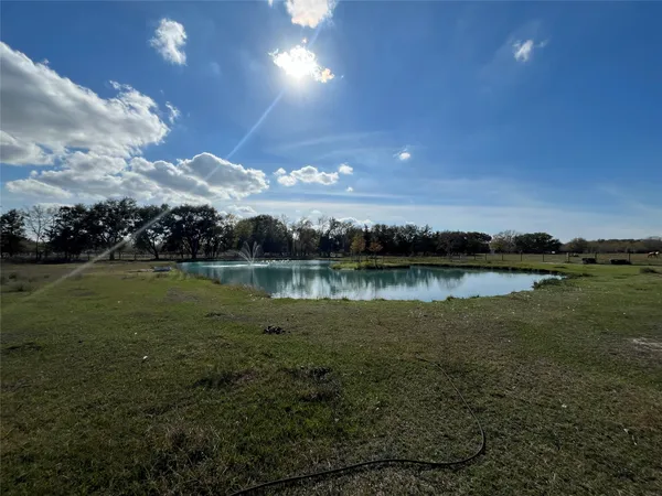 a view of a lake with a city