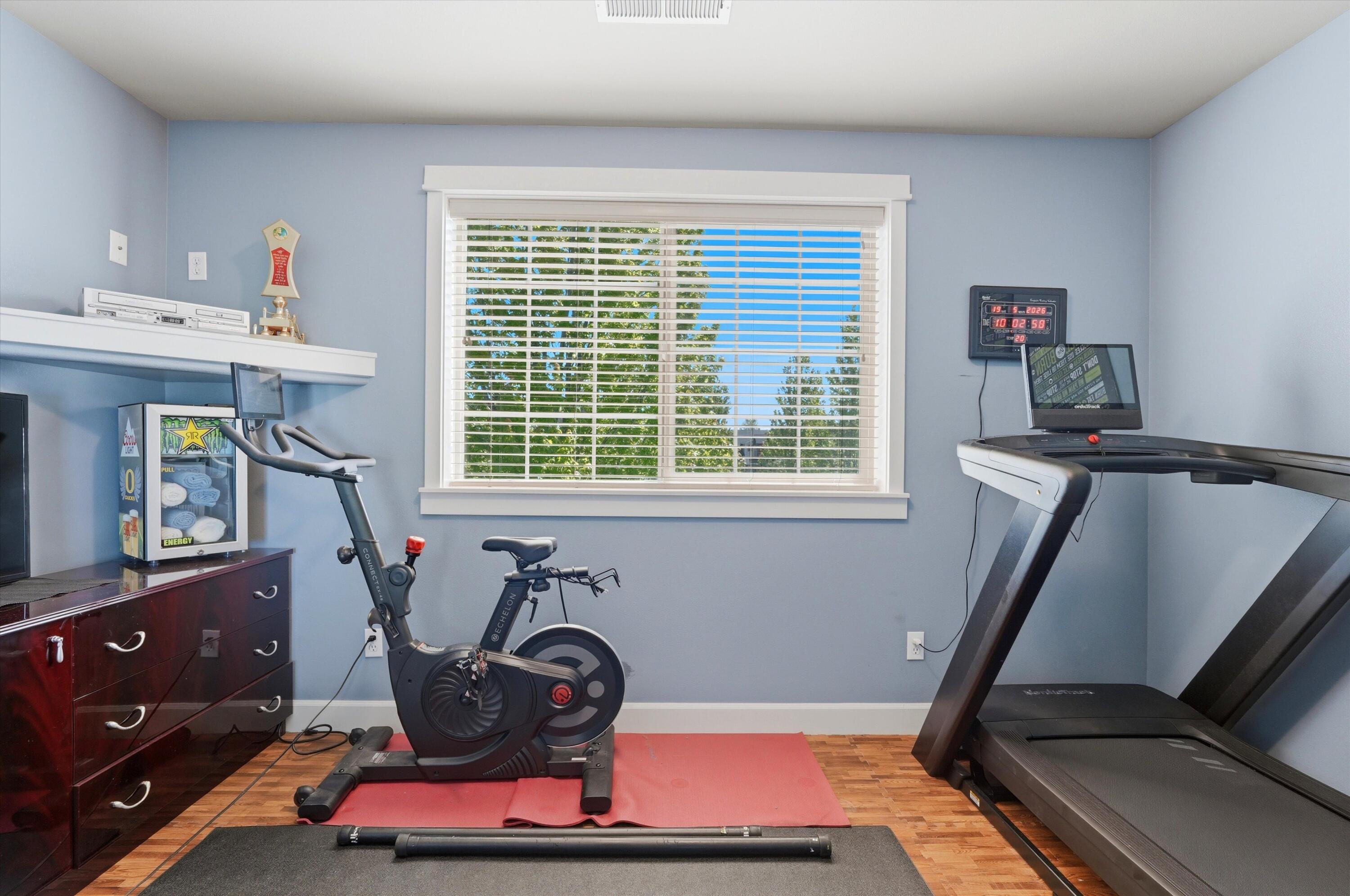 61235 Splendor Lane Bend, OR 97702 - Photo 45 of 52 Attached Flex space currently used as a workout space, could be a nursery or office space, or extended closet space