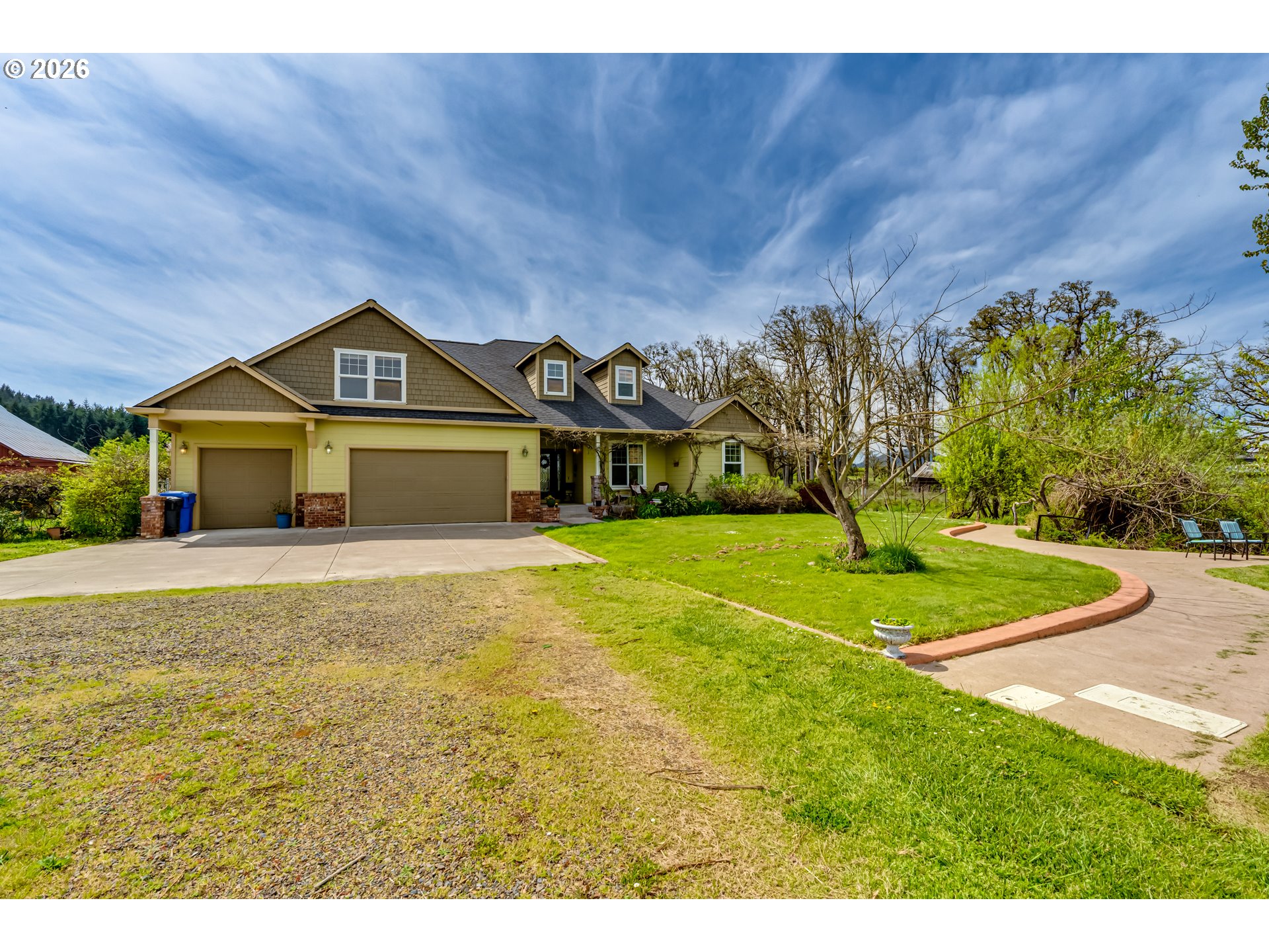 34386 Mathews Road Eugene, OR 97405 - Photo 15 of 48 a front view of a house with a yard