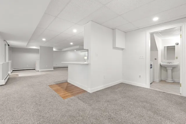 a view of an empty room with a bathroom