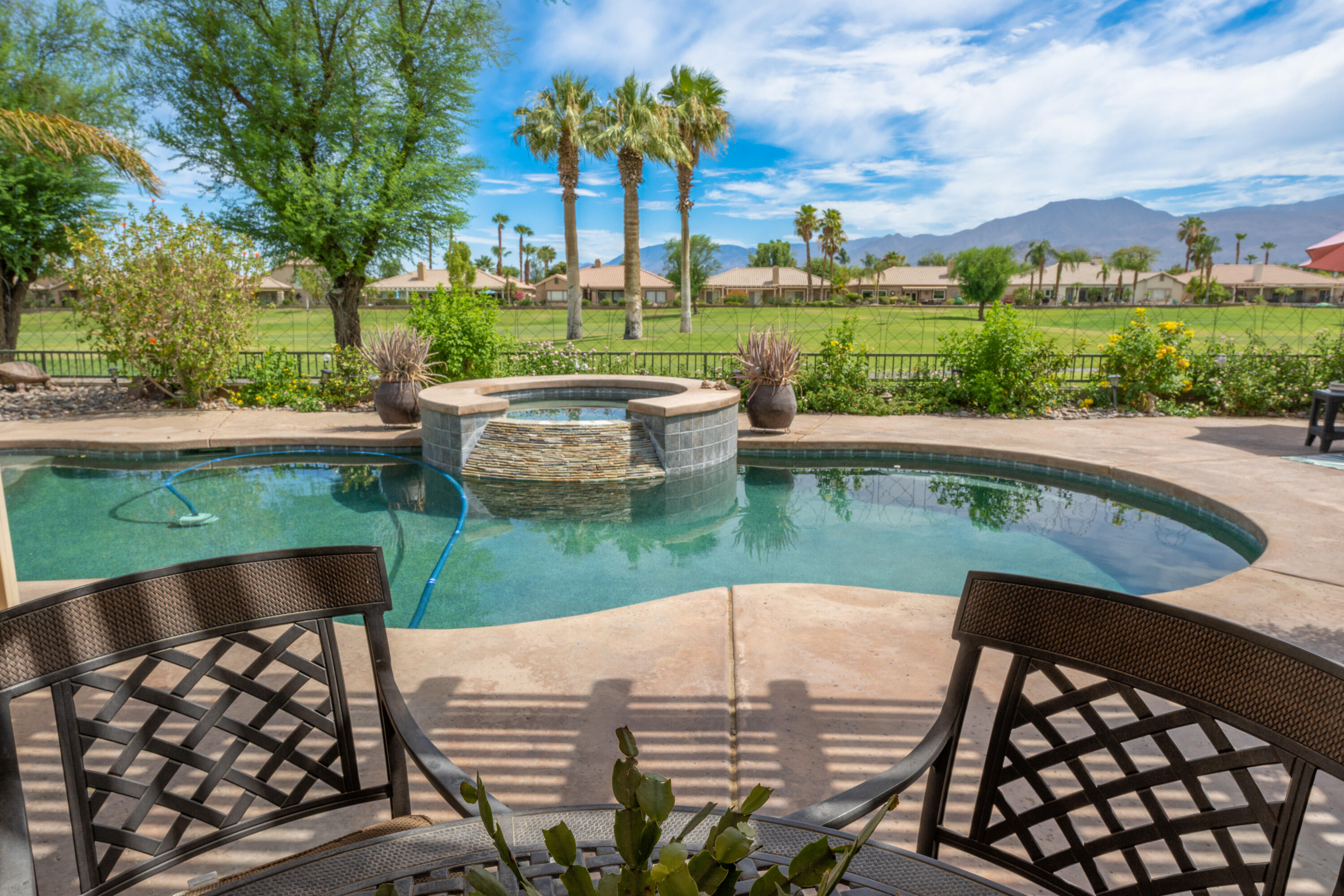 a view of a lake with a yard