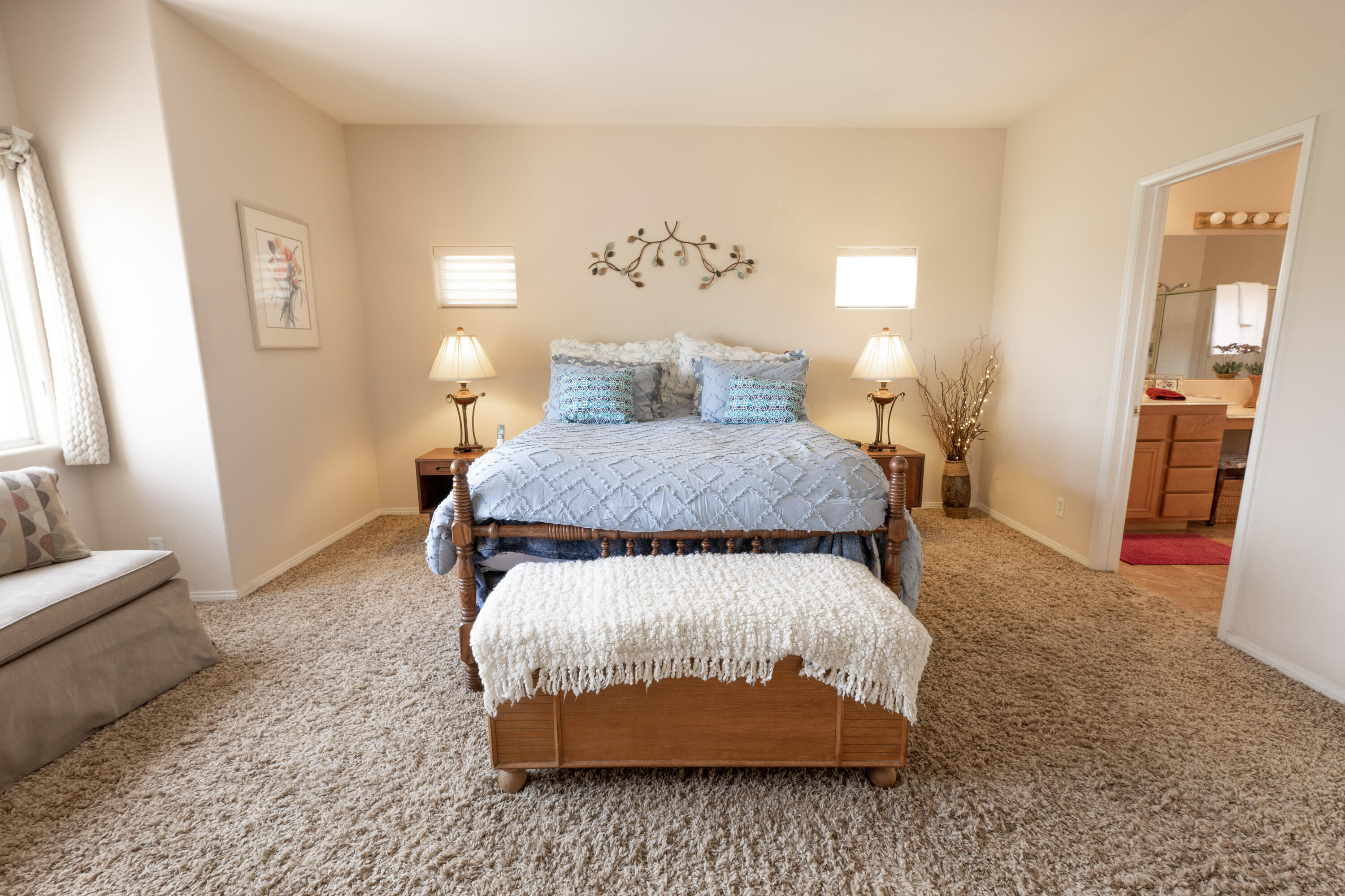 80307 Green Hills Drive Indio, CA 92201 - Photo 23 of 48 a bedroom with a bed and a couch