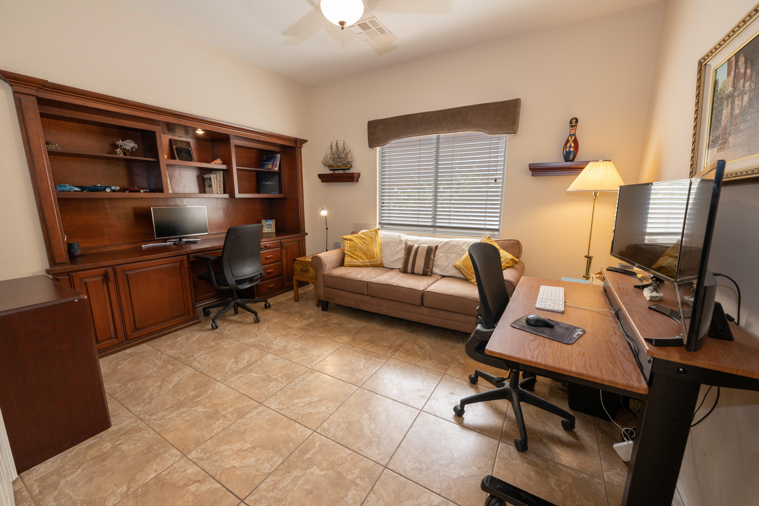 80307 Green Hills Drive Indio, CA 92201 - Photo 26 of 48 a view of a workspace with furniture and a window