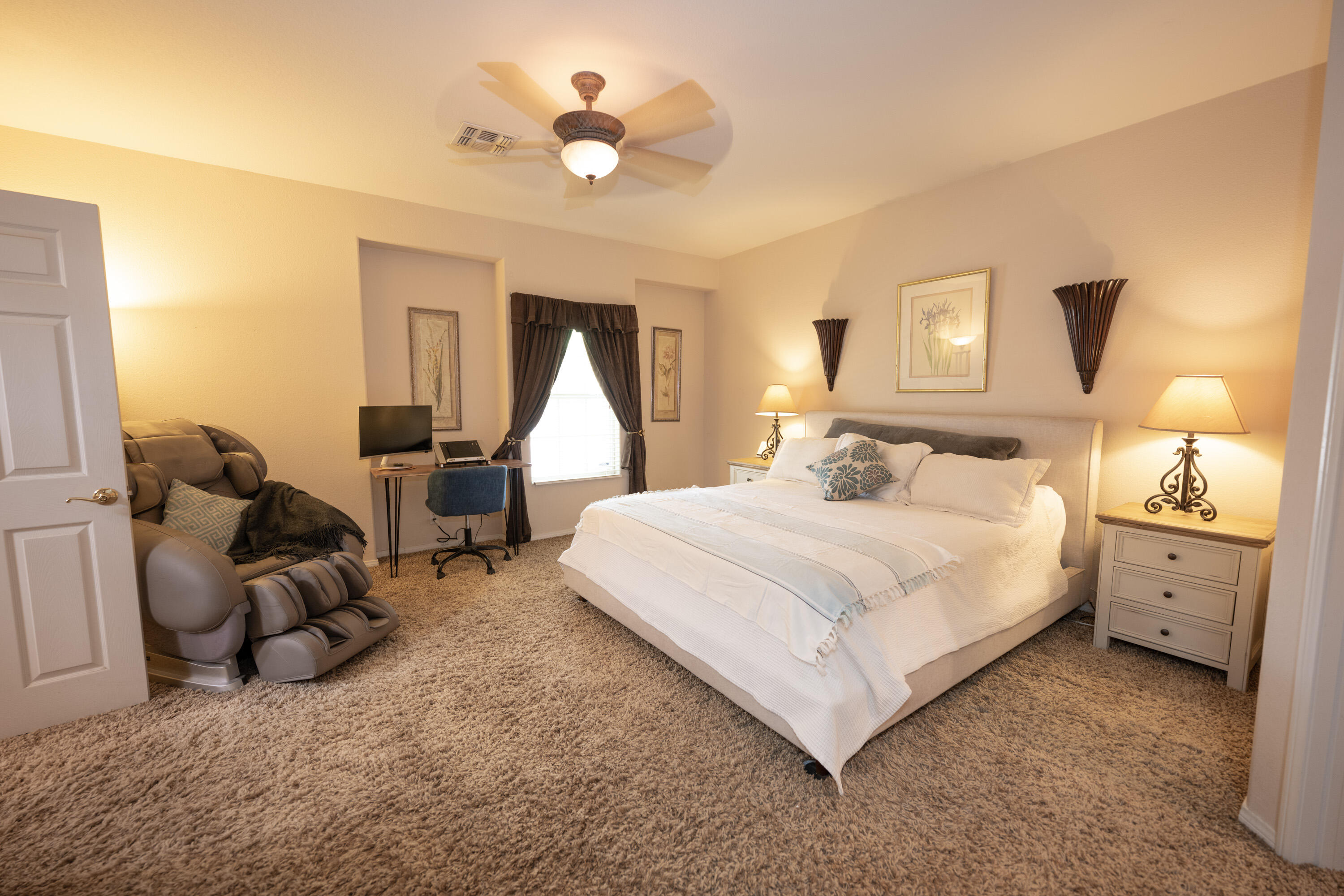 80307 Green Hills Drive Indio, CA 92201 - Photo 28 of 48 a bed room with a bed and a couch