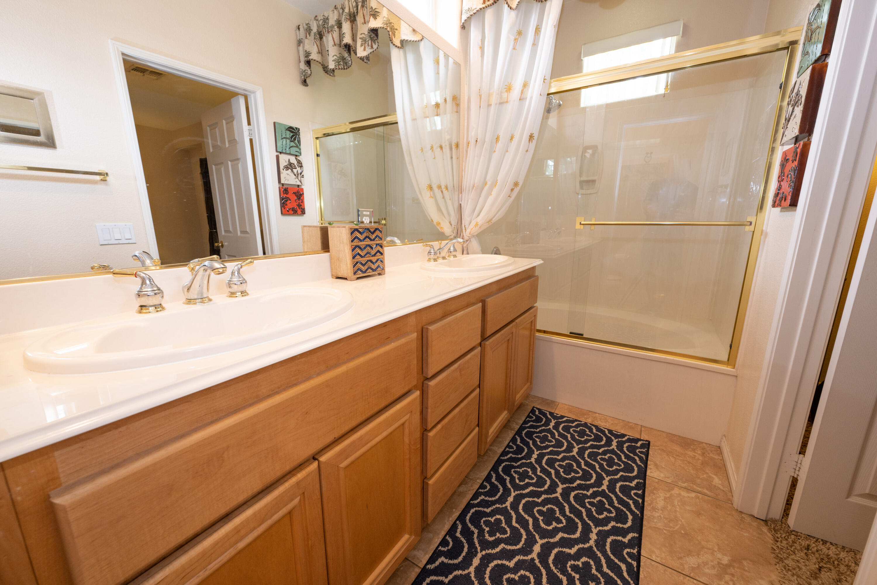 80307 Green Hills Drive Indio, CA 92201 - Photo 29 of 48 a bathroom with a sink and a mirror