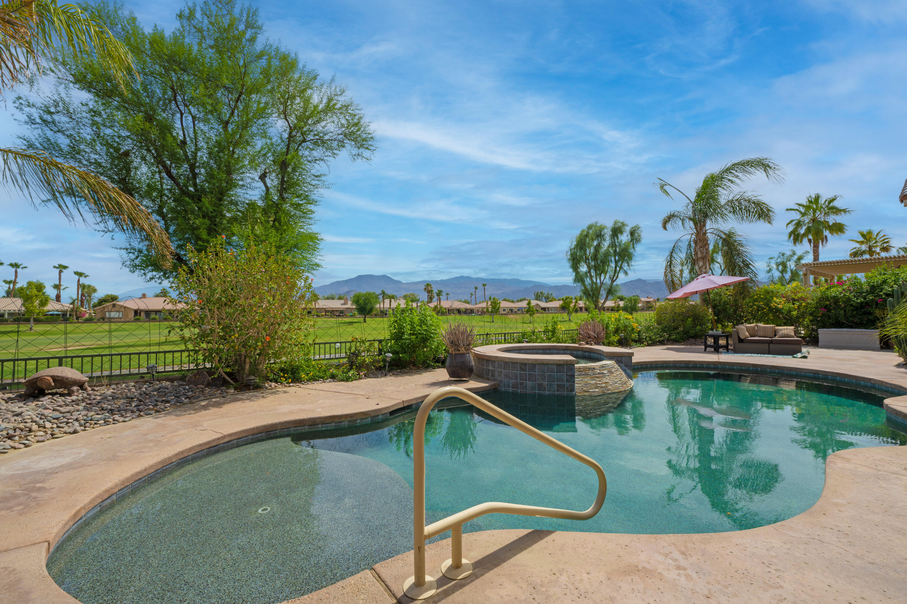 80307 Green Hills Drive Indio, CA 92201 - Photo 35 of 48 an aerial view of a house having swimming pool