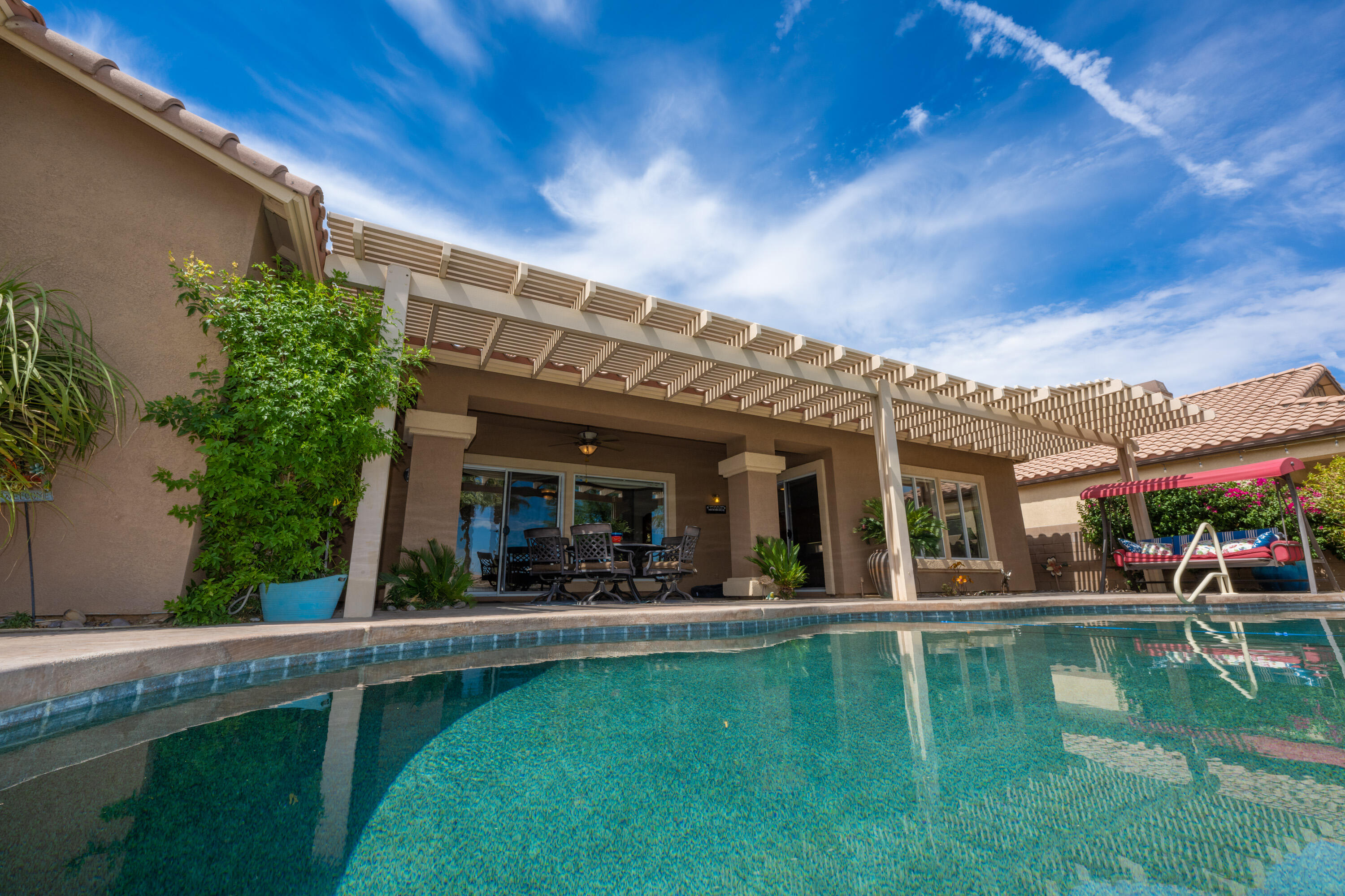 80307 Green Hills Drive Indio, CA 92201 - Photo 36 of 48 a view of a house with a patio
