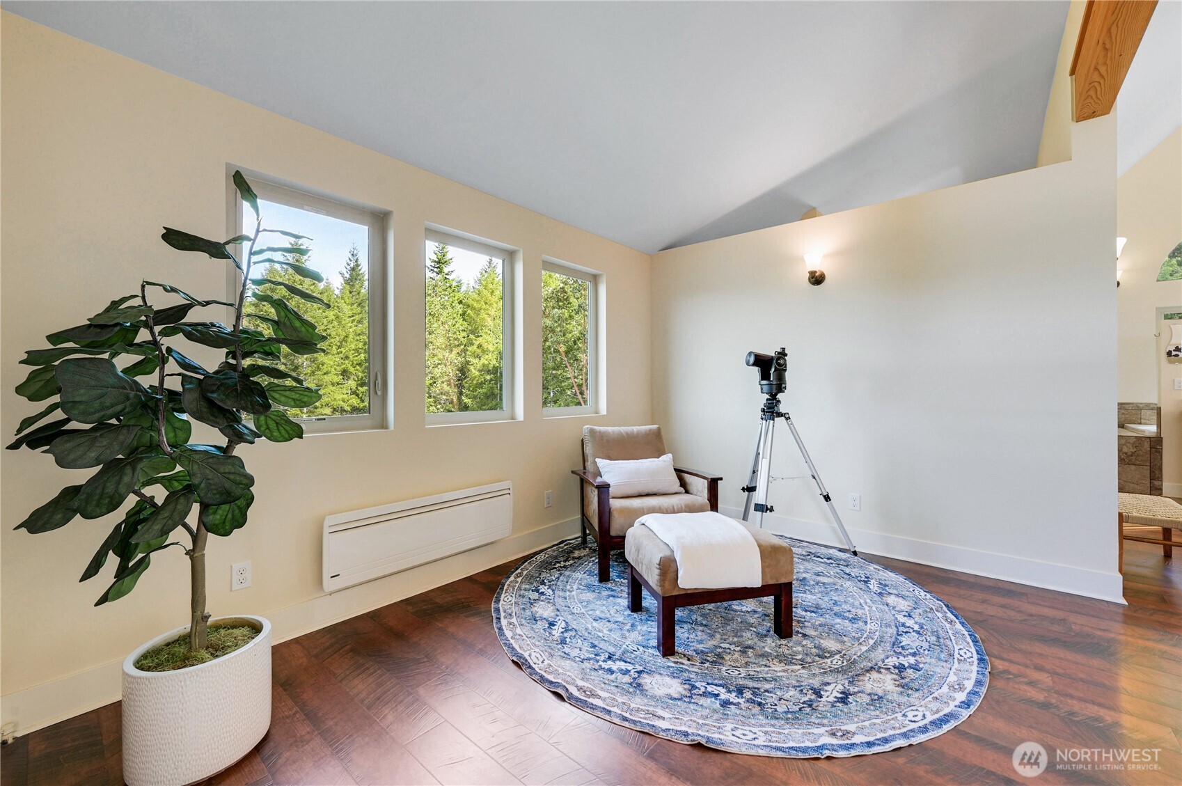 83 Octopus Court Quilcene, WA 98376 - Photo 18 of 40 a living room with furniture and a potted plant