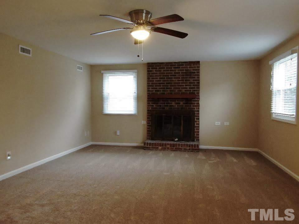 4703 Latimer Road Raleigh, NC 27609 - Photo 18 of 22 a view of an empty room with a window