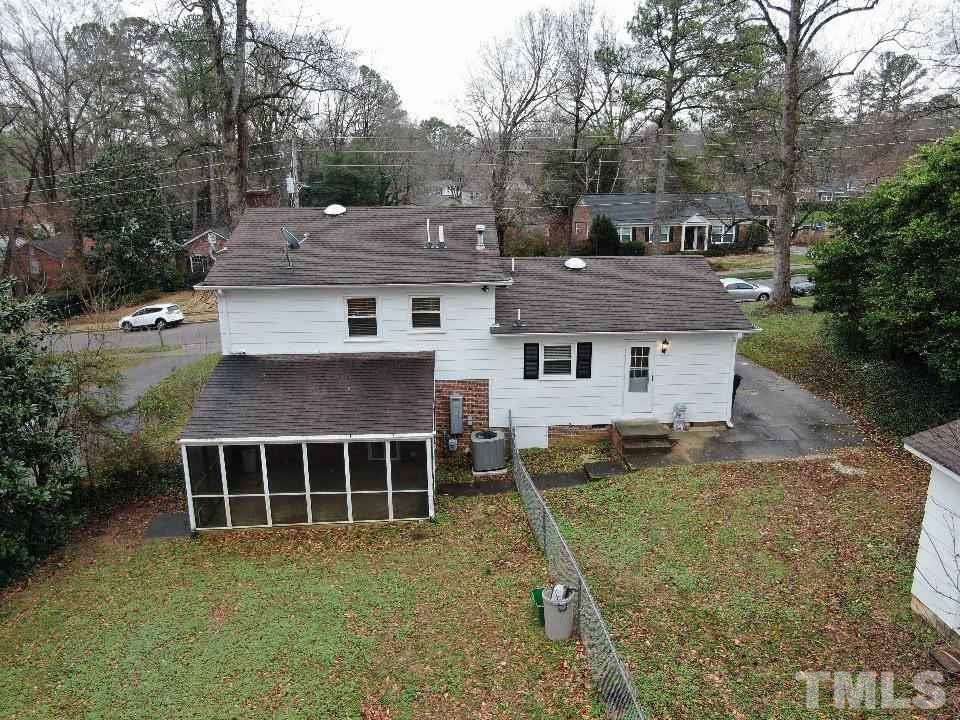 4703 Latimer Road Raleigh, NC 27609 - Photo 20 of 22 aerial view of a house with a yard and garage