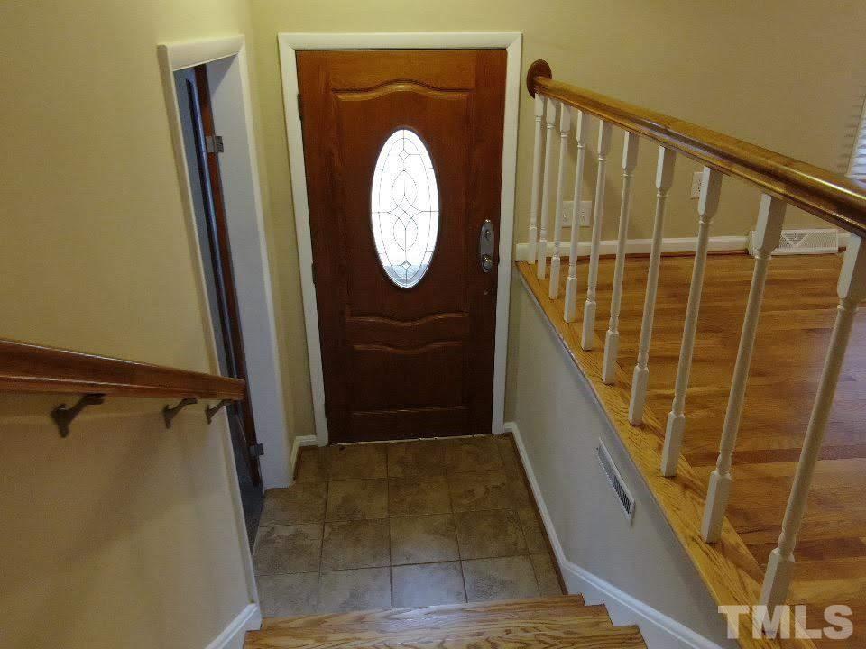 4703 Latimer Road Raleigh, NC 27609 - Photo 10 of 22 a view of a door with wooden floor