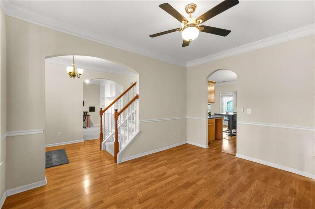 535 Anglewood Trace Stockbridge, GA 30281 - Photo 13 of 73 wooden floor in an empty room with a window