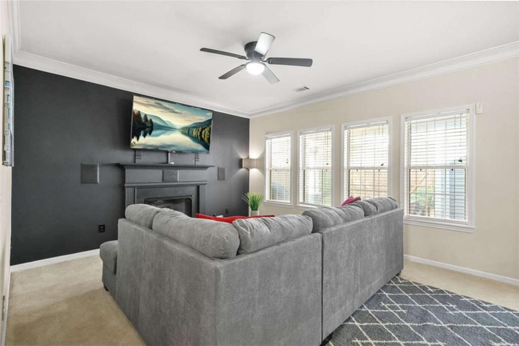 535 Anglewood Trace Stockbridge, GA 30281 - Photo 15 of 73 a living room with furniture and a large window
