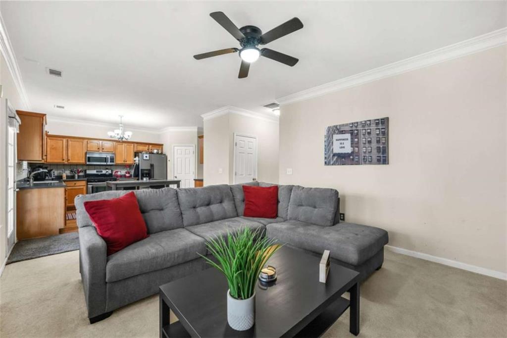 535 Anglewood Trace Stockbridge, GA 30281 - Photo 18 of 73 a living room with furniture and kitchen view