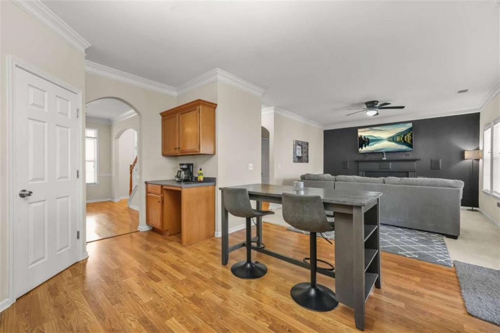 535 Anglewood Trace Stockbridge, GA 30281 - Photo 23 of 73 a view of a workspace room with wooden floor and furniture