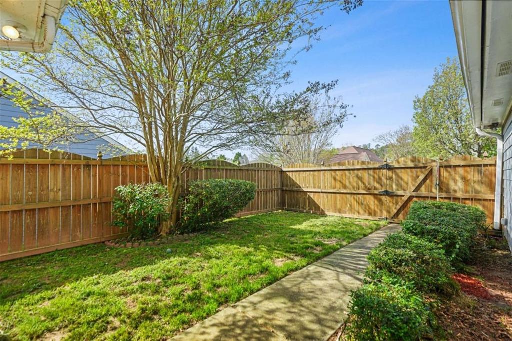 535 Anglewood Trace Stockbridge, GA 30281 - Photo 49 of 73 a backyard of a house with lots of green space