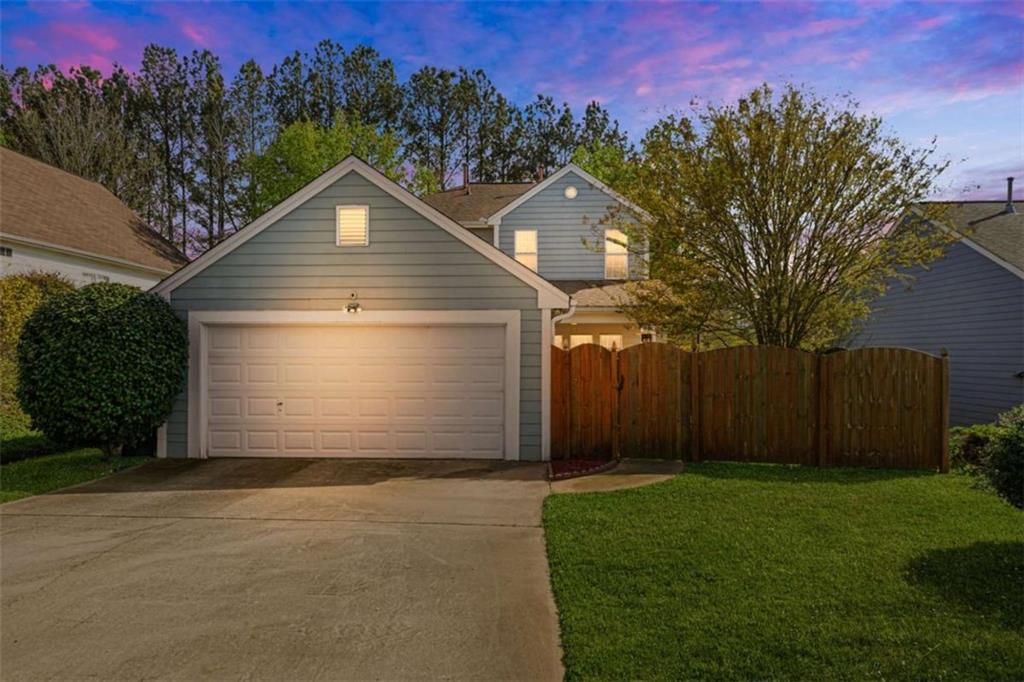 535 Anglewood Trace Stockbridge, GA 30281 - Photo 51 of 73 a front view of house with yard and trees