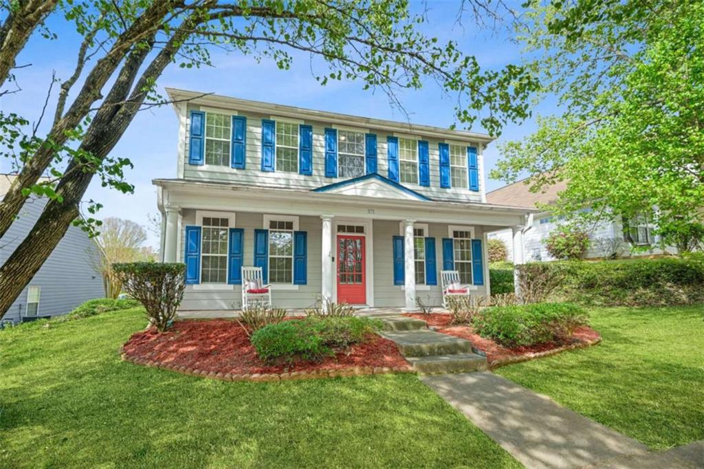 535 Anglewood Trace Stockbridge, GA 30281 - Photo 6 of 73 front view of a brick house with a yard