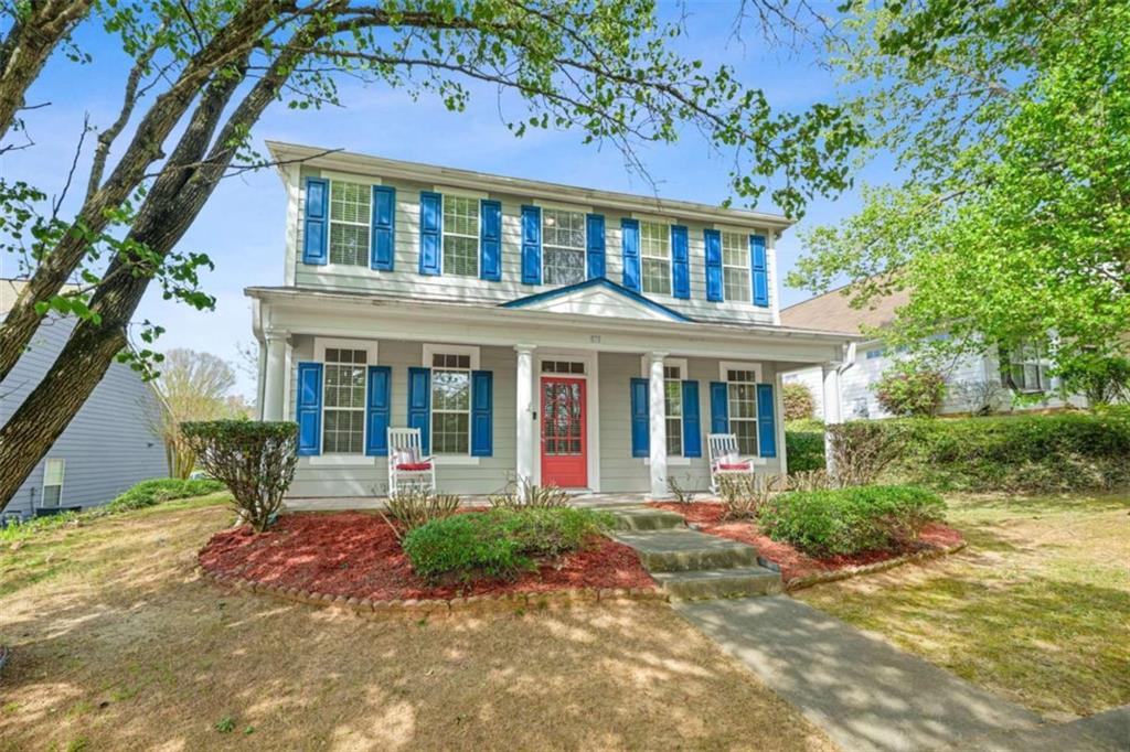 535 Anglewood Trace Stockbridge, GA 30281 - Photo 7 of 73 front view of a brick house with a yard