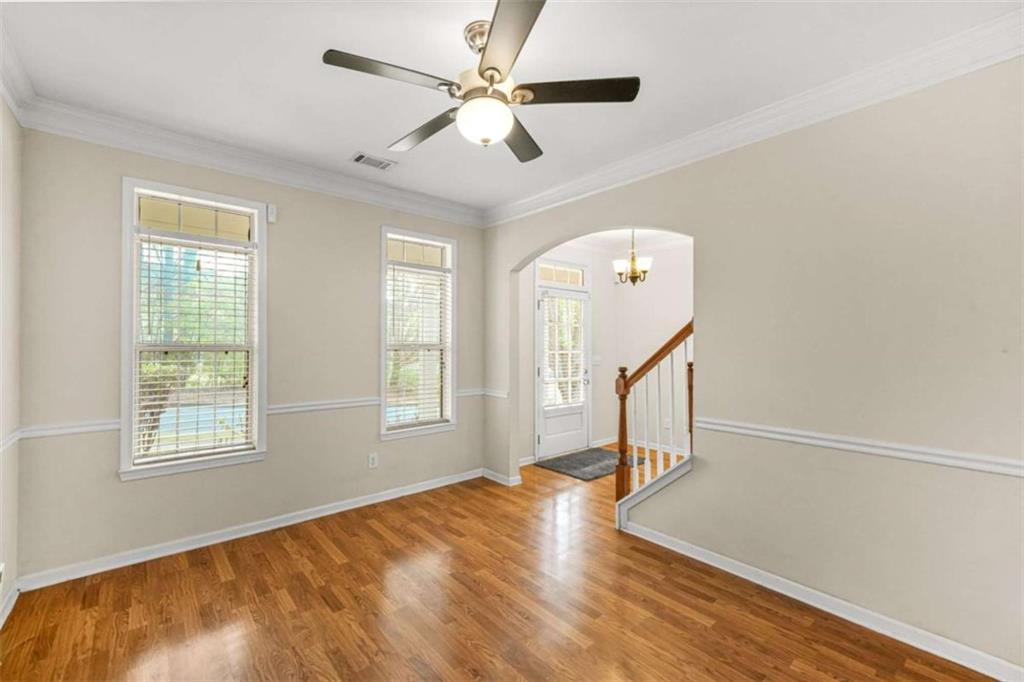 535 Anglewood Trace Stockbridge, GA 30281 - Photo 9 of 73 a view of empty room with wooden floor and fan