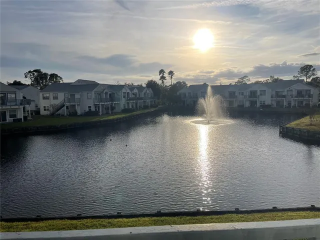 a view of swimming pool with furniture