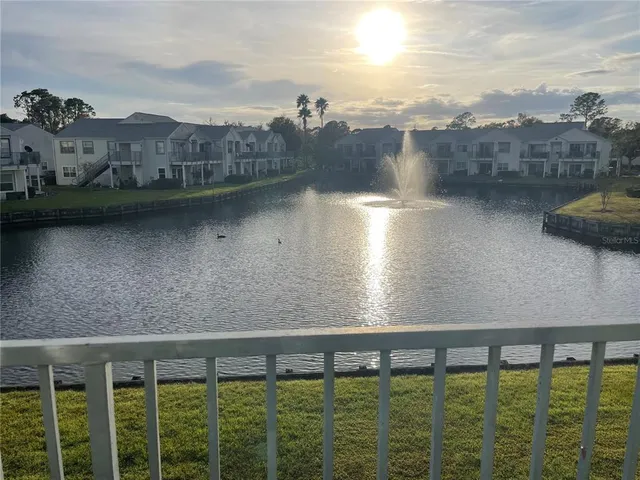 a view of a lake from a balcony