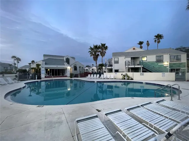 a view of a house with a swimming pool