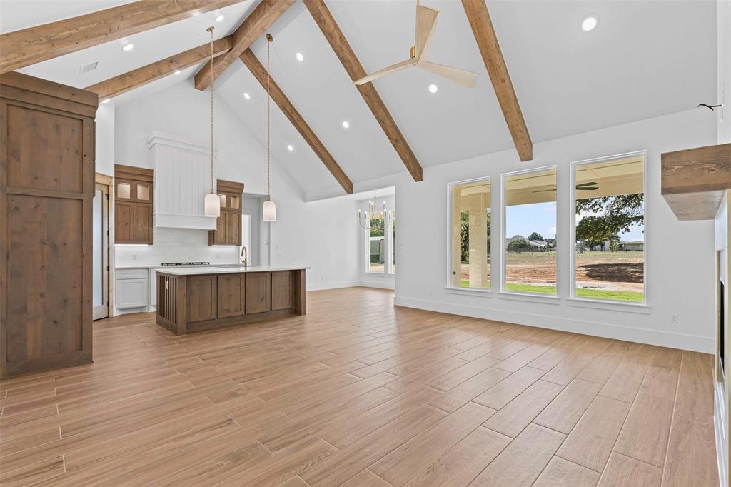 1132 Dobbs Trail Springtown, TX 76082 - Photo 9 of 32 a view of kitchen with cabinets and wooden floor