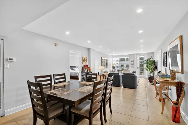 a kitchen with a refrigerator stove and sink