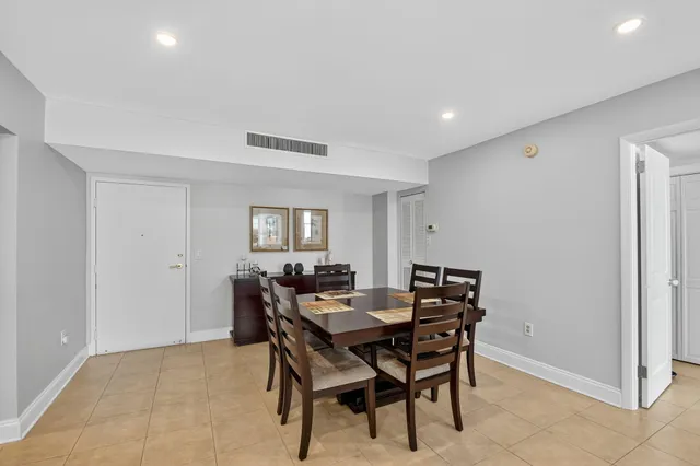 a kitchen with stainless steel appliances granite countertop a stove a sink dishwasher and a microwave