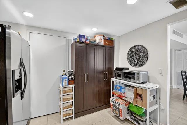 a living room with furniture a rug and a wooden floor