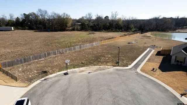 a view of a road with a yard