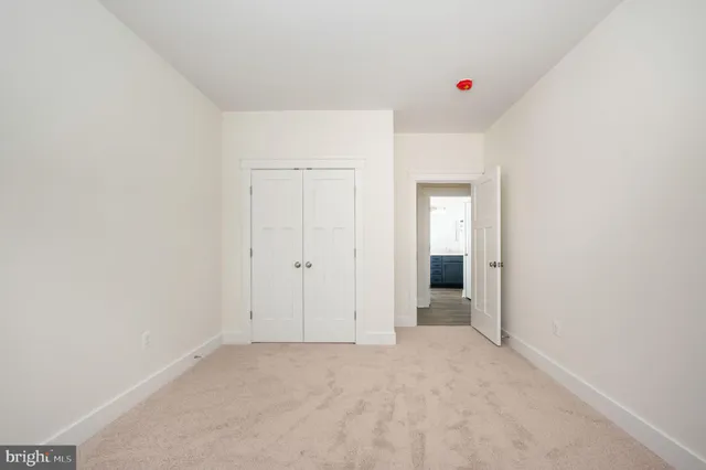 a view of room with hardwood floor