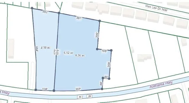 a view of a door with white walls