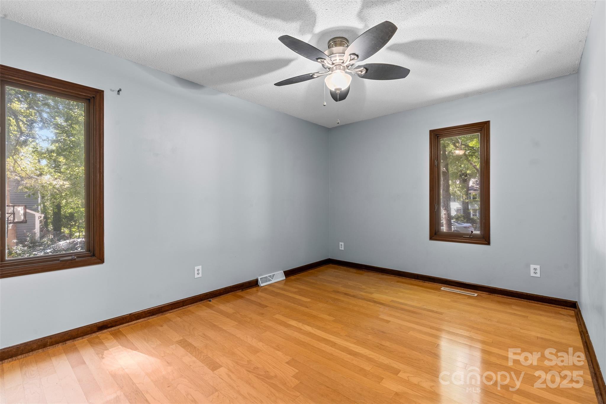 14024 Springwater Drive Matthews, NC 28105 - Photo 15 of 36 a view of an empty room with a window