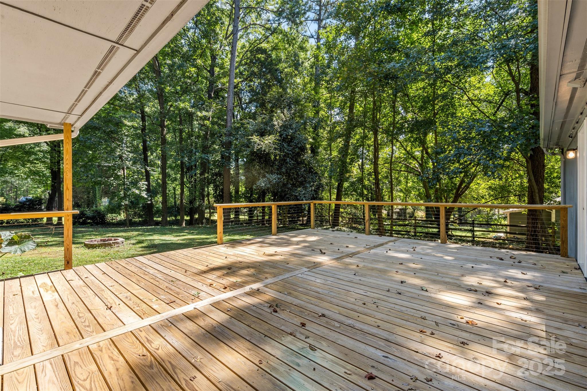 14024 Springwater Drive Matthews, NC 28105 - Photo 29 of 36 a view of a backyard with wooden floor and fence