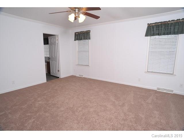 205 Phifer Road Cleveland, NC 27013 - Photo 5 of 17 a view of an empty room with a window