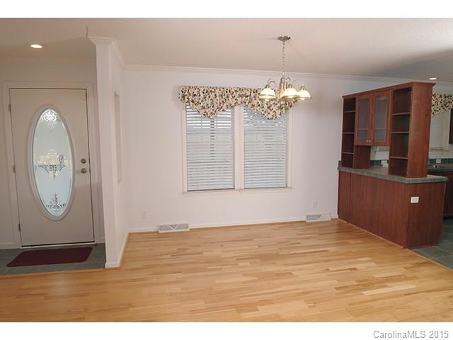205 Phifer Road Cleveland, NC 27013 - Photo 8 of 17 a view of a room with wooden floor and workspace